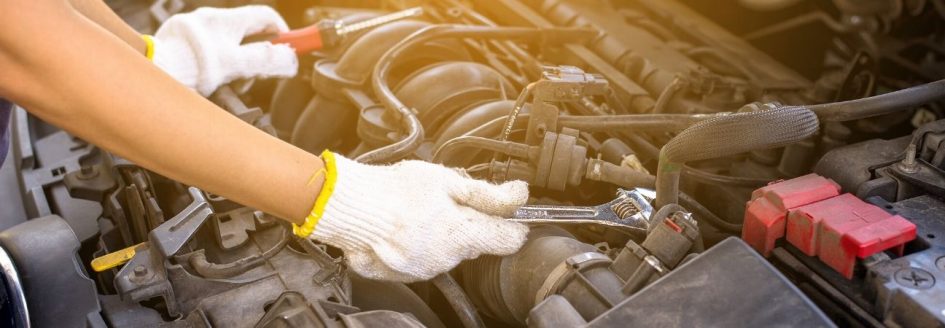 a auto repair expert cleaning jaguar parts